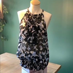 Black and gray ruffle top with banded bottom